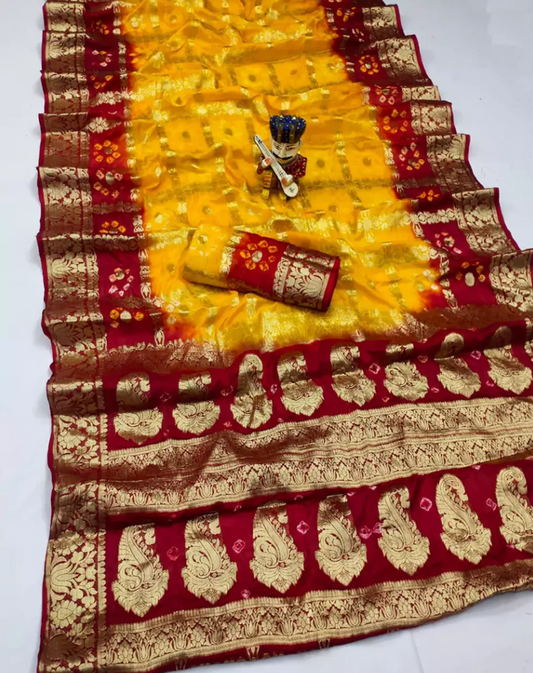 Yellow And Maroon hand bandhej silk saree with zari weaving work