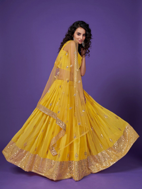 Yellow Sequanece Embroidered Georgette Haldi Wear Lehenga Choli