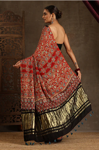 Traditional Ajrakh Hand Block Printed & Natural Dyed Tissue Pallu Modal Saree With Tassels