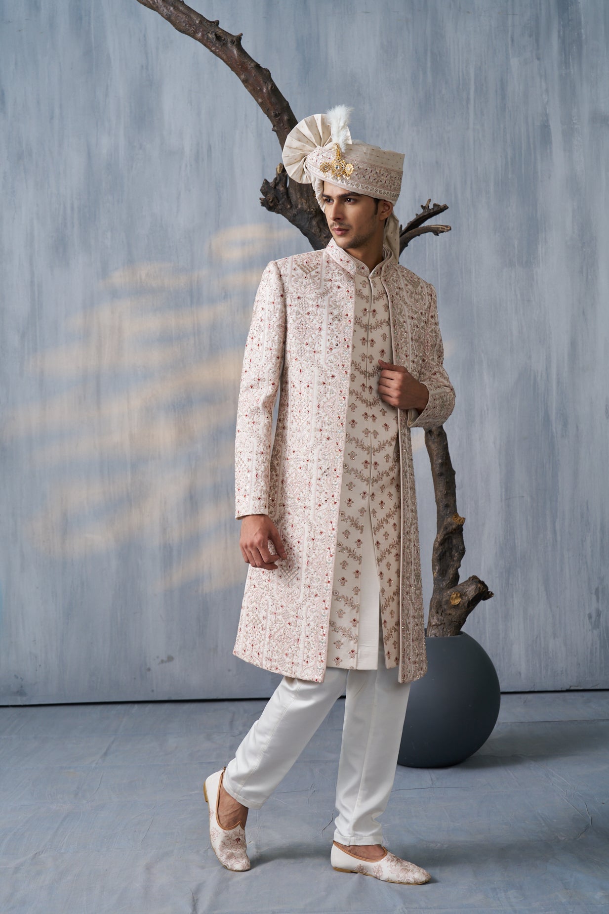 CREAM SHERWANI WITH ALL-OVER TRADITIONAL EMBROIDERY