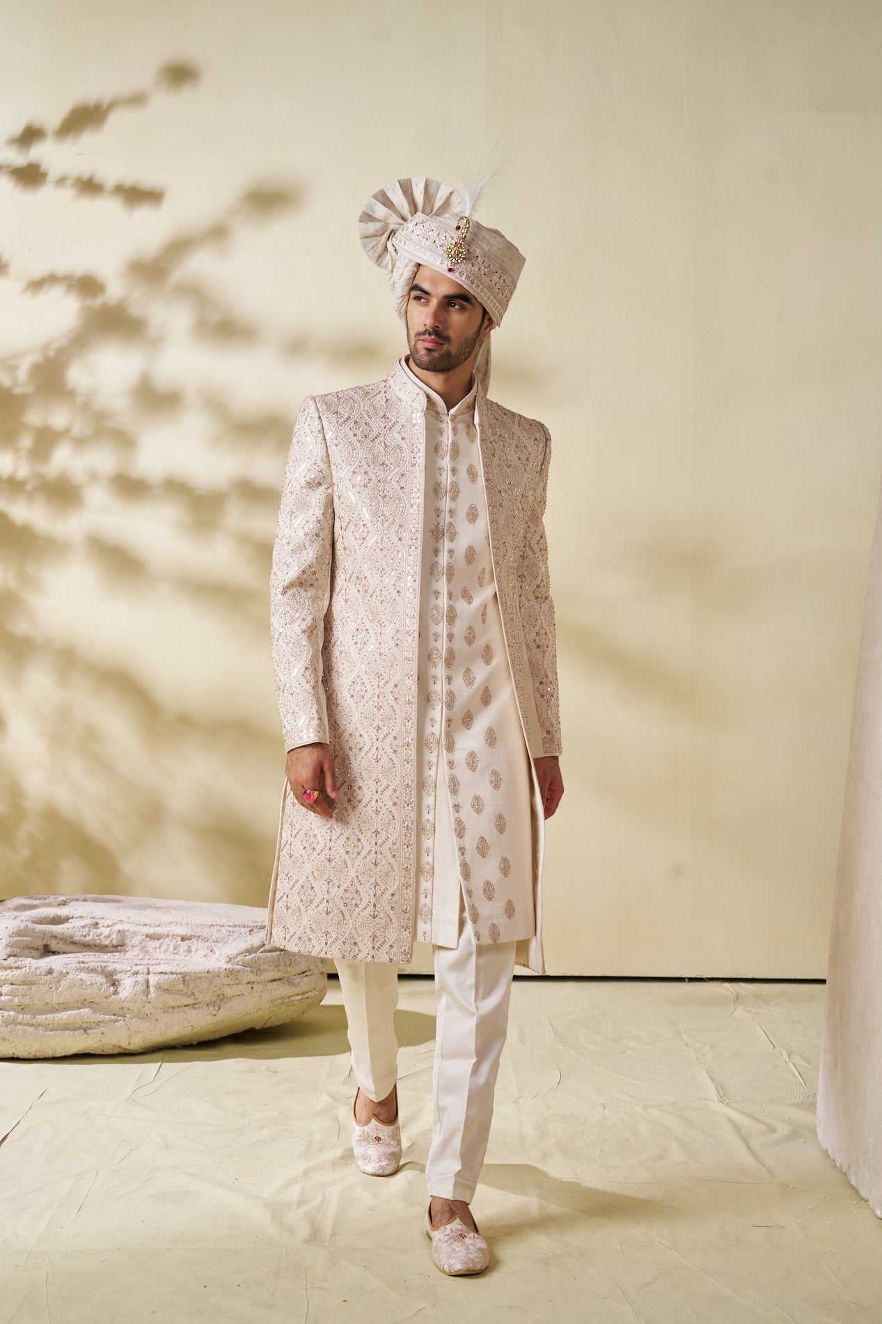 CREAM SHERWANI WITH ALL-OVER TRADITIONAL EMBROIDERY