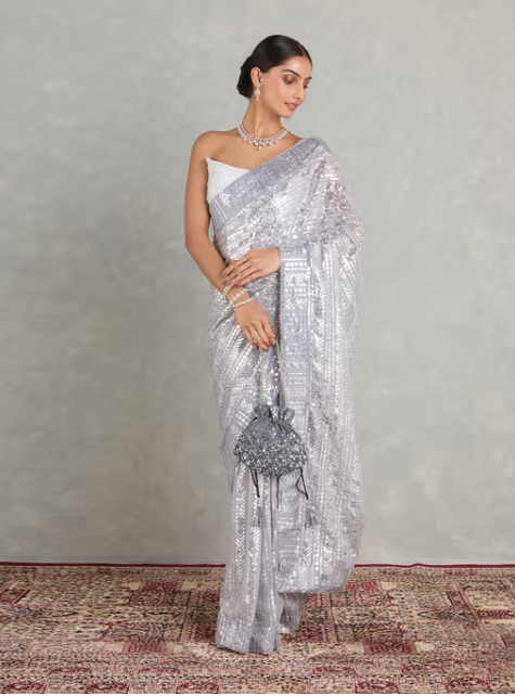 Nyri Silver Georgette Embellished Sequined Beads and Stones Saree and Unstitched Blouse