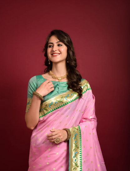 Baby pink color paithani silk saree with zari weaving work