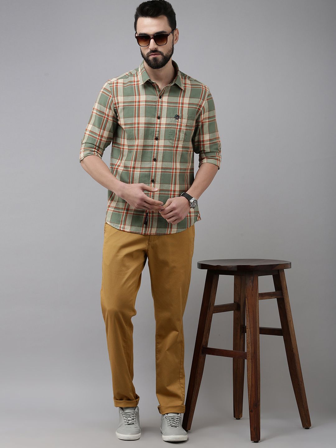 Men Khaki Solid Mid-Rise Regular Trousers