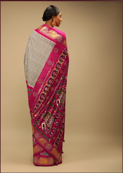 Rani Pink Patola Saree In Soft Silk With Brown And White Stripes And Stick On Kundan Work