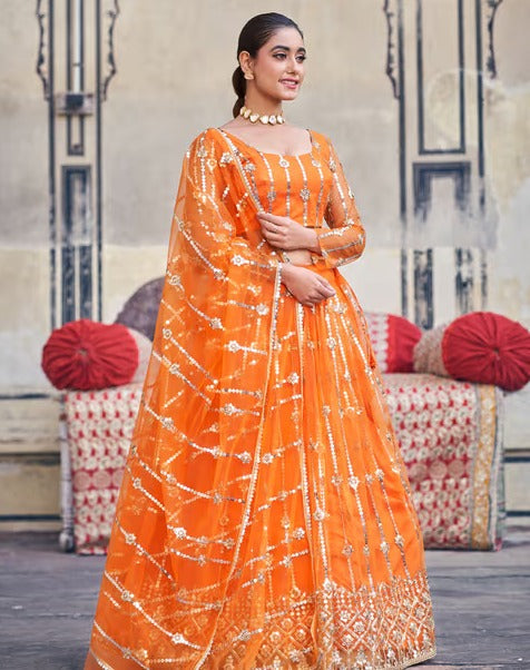 Orange Net Semi-Stitched Lehenga and Unstitched Blouse with Dupatta