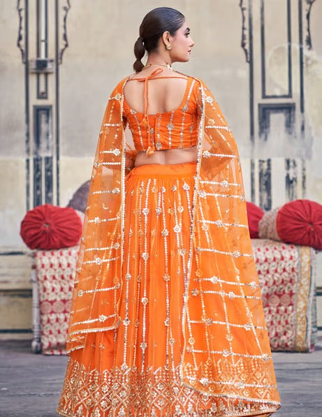 Orange Net Semi-Stitched Lehenga and Unstitched Blouse with Dupatta