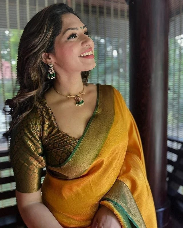 Bewitching Yellow Soft Silk Saree with Lissome Blouse Piece