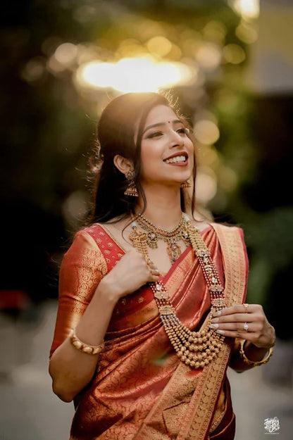 Flaunt Red Soft Banarasi Silk Saree Gleaming Blouse Piece