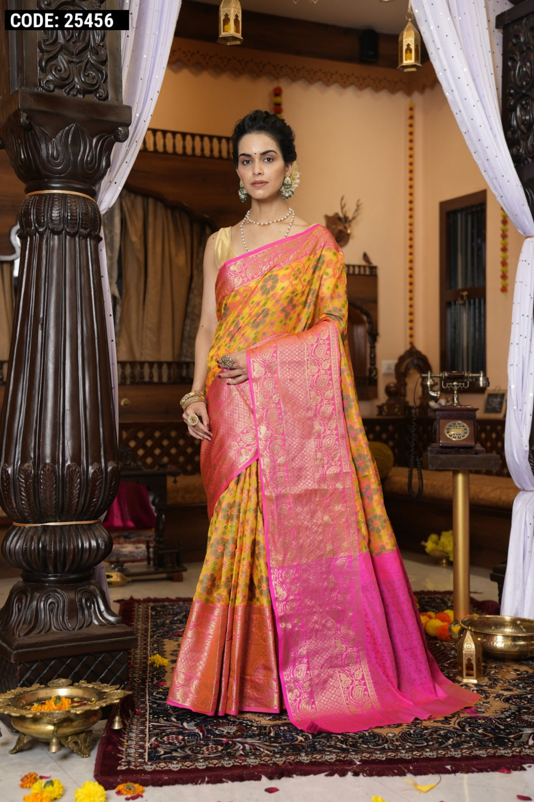 Yellow color soft organza silk saree with zari weaving work