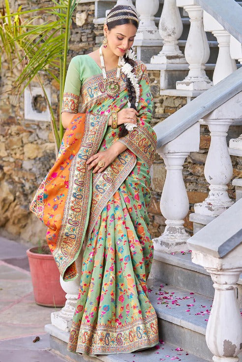 Staring Pista Pashmina saree With Efflorescence Blouse Piece