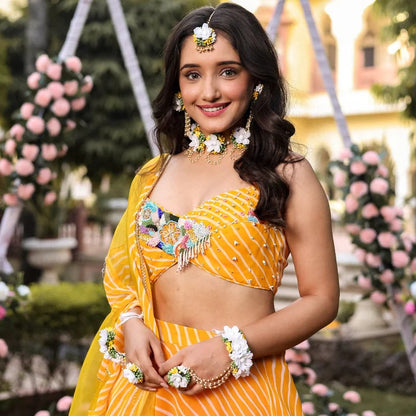 LAVANYATHELABEL YELLOW LEHERIYA LEHENGA