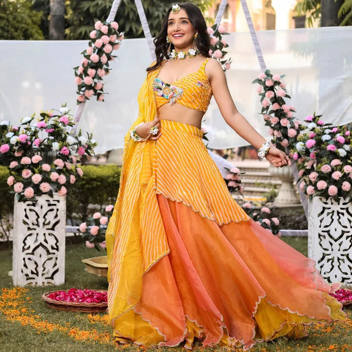 LAVANYATHELABEL YELLOW LEHERIYA LEHENGA