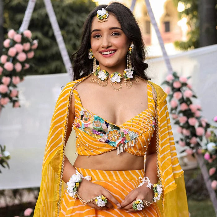 LAVANYATHELABEL YELLOW LEHERIYA LEHENGA