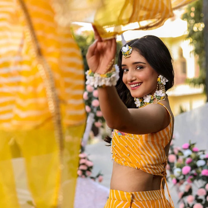 LAVANYATHELABEL YELLOW LEHERIYA LEHENGA