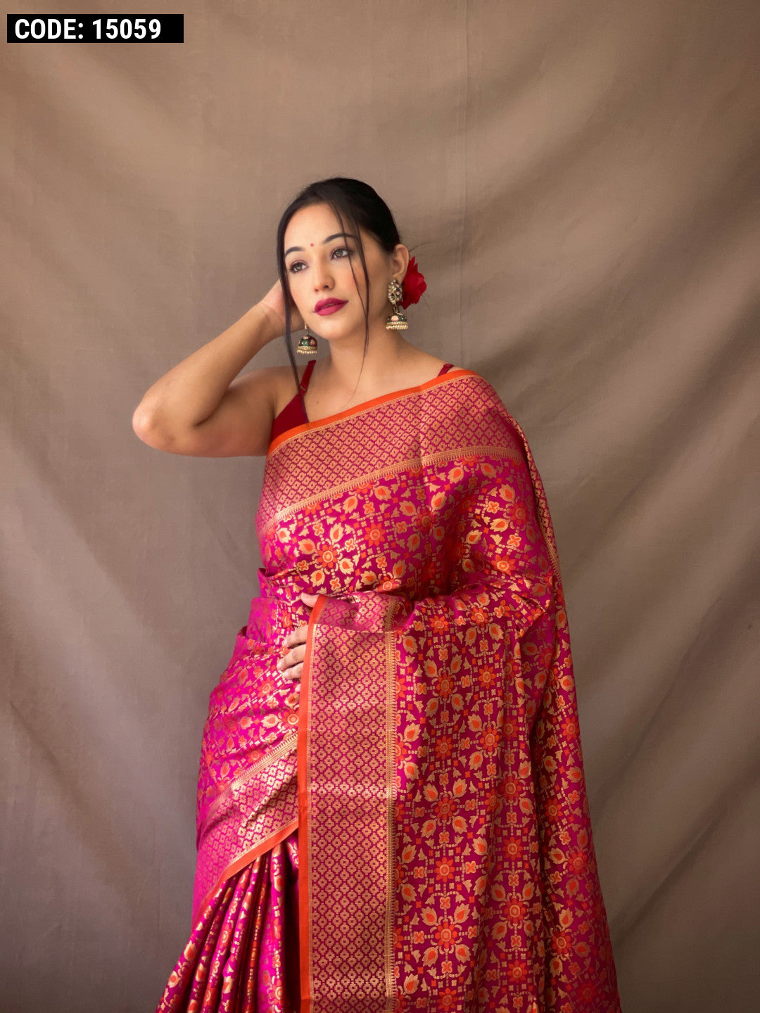 Magenta color patola silk saree with zari weaving work