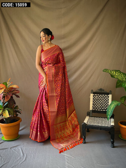 Magenta color patola silk saree with zari weaving work