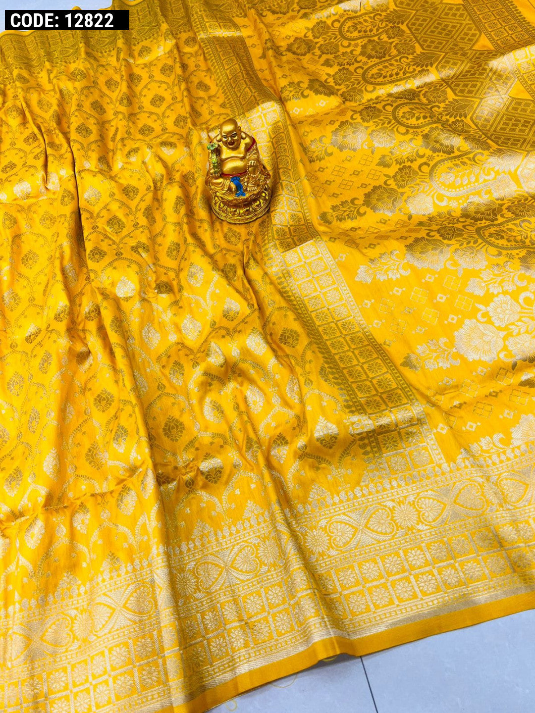 Yellow color banarasi silk saree with golden zari weaving work