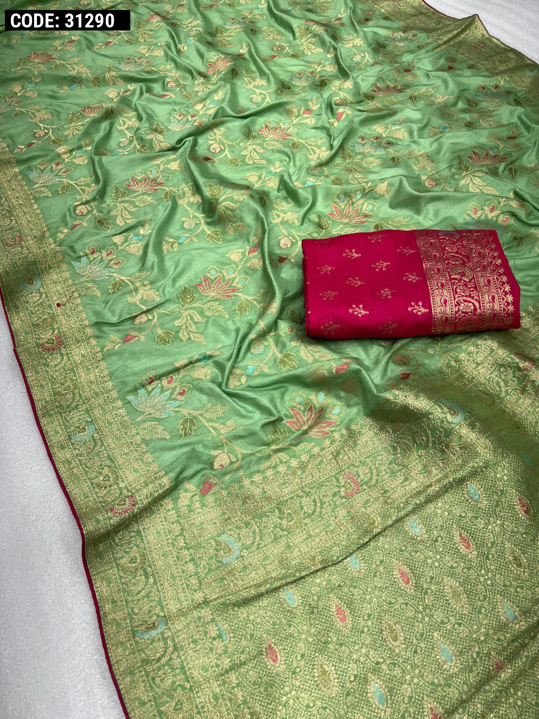 Pista green color dola silk saree with zari weaving work