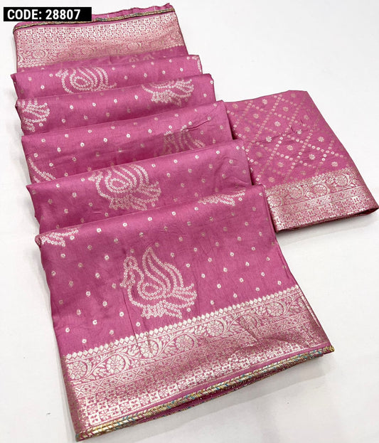 Pink color soft muslin silk saree with zari weaving work