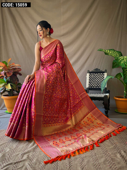 Magenta color patola silk saree with zari weaving work