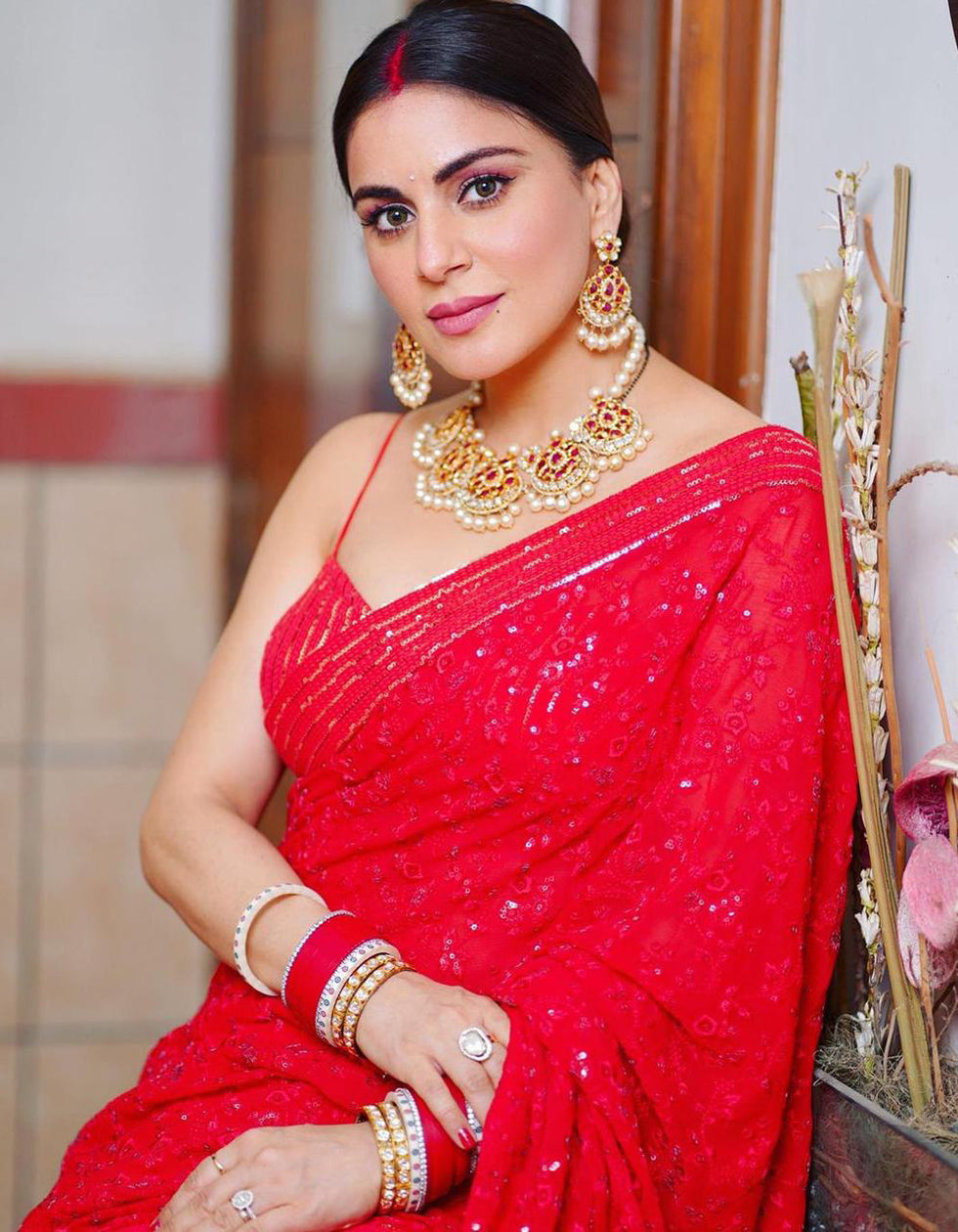 Shraddha Arya Red Georgette Wedding Wear Saree