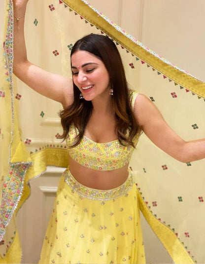 Dhavni Bhasushali Yellow Georgette Embroidery Bollywood Wear Lehenga Choli