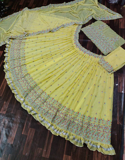 Dhavni Bhasushali Yellow Georgette Embroidery Bollywood Wear Lehenga Choli