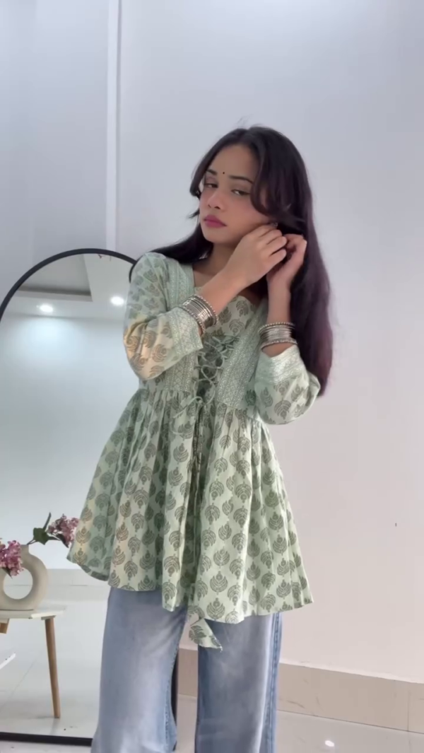 women rayon embroidery short kurti. - Image 5