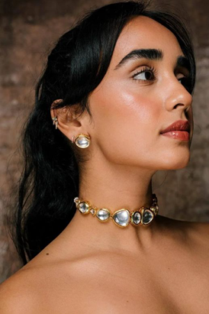 Oxidised Antique Gold-Plated Tribal Necklace Set with Dome Accent & Red-Green Stone